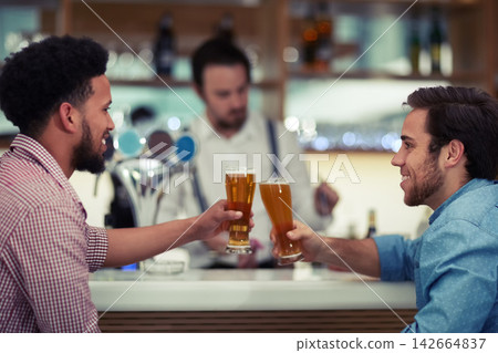 Men, smile and toast with beer at pub for communication, collaboration and relax in restaurant. Friends, support and cheers with alcohol beverage for happy hour, reunion and celebration together Men, smile and toast with beer at pub for communication, collaboration and relax in restaurant. Friends, support and cheers with alcohol beverage for happy hour, reunion and celebration together 142664837