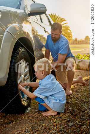 Outdoors, man and child with cleaning car in nature for teamwork, maintenance and childhood development. Dad, boy and kid with washing vehicle on ground for teaching, hygiene and help in parenthood Outdoors, man and child with cleaning car in nature for teamwork, maintenance and childhood development. Dad, boy and kid with washing vehicle on ground for teaching, hygiene and help in parenthood 142665020