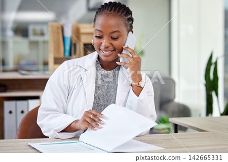 Phone call, doctor or black woman in office with paperwork, smile and files for hospital schedule. Healthcare, planning and medical professional with cellphone, advice and health insurance documents Phone call, doctor or black woman in office with paperwork, smile and files for hospital schedule. Healthcare, planning and medical professional with cellphone, advice and health insurance documents 142665331
