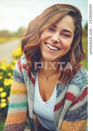 Woman, portrait and flowers with smile on field or autumn environment, countryside or outdoor. Female person, face and floral daisies in sunshine with happiness for England trip, meadow or holiday Woman, portrait and flowers with smile on field or autumn environment, countryside or outdoor. Female person, face and floral daisies in sunshine with happiness for England trip, meadow or holiday 142666094