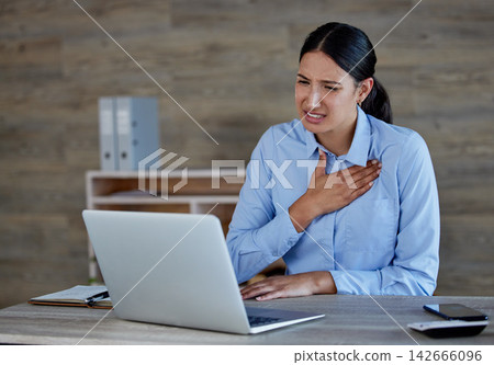 Stress, laptop and woman in office with chest pain from bad news, email or negative business review or feedback. Computer, anxiety or accountant with heartburn disaster from tax, audit or bankruptcy Stress, laptop and woman in office with chest pain from bad news, email or negative business review or feedback. Computer, anxiety or accountant with heartburn disaster from tax, audit or bankruptcy 142666096
