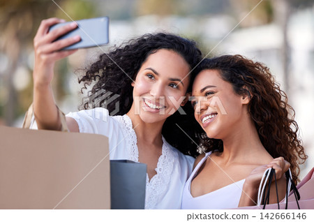 Shopping, women and friends in city, selfie and retail with social media, influencer and purchase. People, outdoor and girls with gift bags, summer and mobile user with vlog, sale and discount deal Shopping, women and friends in city, selfie and retail with social media, influencer and purchase. People, outdoor and girls with gift bags, summer and mobile user with vlog, sale and discount deal 142666146