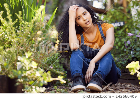 Plants, thinking and woman worker in garden with stress, burnout and overworked in small business. Florist, exhausted and fatigue with headache of work pressure, problem and backyard of shop owner Plants, thinking and woman worker in garden with stress, burnout and overworked in small business. Florist, exhausted and fatigue with headache of work pressure, problem and backyard of shop owner 142666409