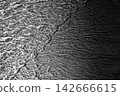 Intricate platinum ripples flow into the pitch-black abyss. 142666615