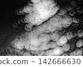 Multiple waves of light and bubble layers swirling in pitch black. 142666630