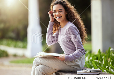 University, portrait and happy woman with books at campus park for reading, study or exam research. Education, college and gen z student outdoor with notebook for homework, learning or project info 142666641