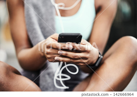 Hands, exercise and woman with smartphone, fitness and listen to music with break, relax and contact. Closeup, person or girl with cellphone, mobile user and connection with workout or check progress Hands, exercise and woman with smartphone, fitness and listen to music with break, relax and contact. Closeup, person or girl with cellphone, mobile user and connection with workout or check progress 142666964