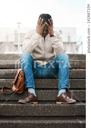 Business man, unemployed and depression on stairs with mistake, reflection and worry in city. African person, stress and anxiety on steps in metro town with loss, crisis and jobless with bankruptcy 142667104