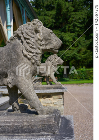 Lion statues detail in Josheps Cross at Stolberg Harz Lion statues detail in Josheps Cross at Stolberg Harz 142667279