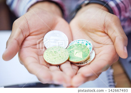 Hands, person and cryptocurrency for investment, accounting and coins for business and finance. Trader, profit and money or gold for stock market, budget and banking for savings and exchange Hands, person and cryptocurrency for investment, accounting and coins for business and finance. Trader, profit and money or gold for stock market, budget and banking for savings and exchange 142667493