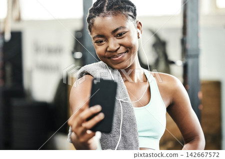 Gym, fitness or happy black woman in selfie on workout, exercise or training break for social media. Relax, sports or healthy African girl in photo for online profile picture with smile or wellness Gym, fitness or happy black woman in selfie on workout, exercise or training break for social media. Relax, sports or healthy African girl in photo for online profile picture with smile or wellness 142667572
