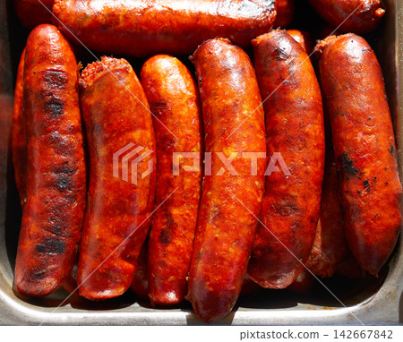Chorizo sausage cooked at barbecue 142667842