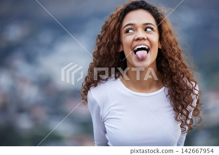Tongue out, funny face and fitness woman in nature for training, exercise or morning cardio break. Silly, moody and gen z runner outdoor with comic expression, fun or quirky personality for workout Tongue out, funny face and fitness woman in nature for training, exercise or morning cardio break. Silly, moody and gen z runner outdoor with comic expression, fun or quirky personality for workout 142667954