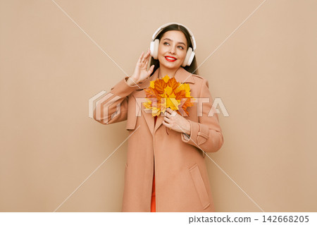 A girl listens to music A girl listens to music 142668205