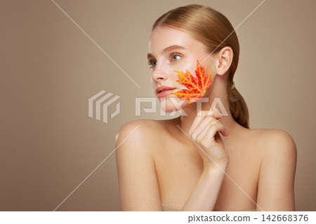 Autumn portrait of beautiful woman with clean fresh skin Autumn portrait of beautiful woman with clean fresh skin 142668376