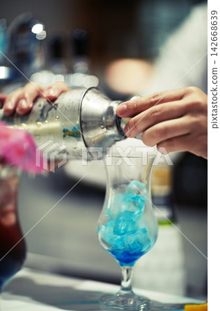 Cocktail, alcohol and drink in nightclub, bar or New Years event for celebration. Hands, shaker and glass for club, party or social gathering with beverage and festive restaurant or pub for bartender Cocktail, alcohol and drink in nightclub, bar or New Years event for celebration. Hands, shaker and glass for club, party or social gathering with beverage and festive restaurant or pub for bartender 142668639