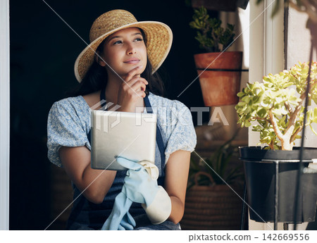 Girl, florist and thinking with tablet in garden to order supplies, inventory management and market research for business. Female gardener, digital tech and thoughts or ideas for nursery planning. Girl, florist and thinking with tablet in garden to order supplies, inventory management and market research for business. Female gardener, digital tech and thoughts or ideas for nursery planning. 142669556