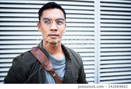 Portrait, serious and business man in city for travel, career or creative work opportunity in Mexico. Face, glasses and confident professional outdoor, entrepreneur and designer on morning commute Portrait, serious and business man in city for travel, career or creative work opportunity in Mexico. Face, glasses and confident professional outdoor, entrepreneur and designer on morning commute 142669662