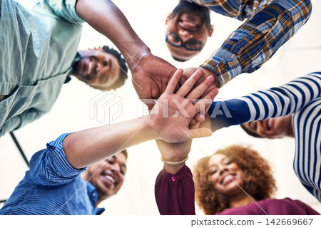 Teamwork, hands and business people in office with support, solidarity and goal motivation in low angle portrait. Partnership, equality and group in unity for about us, training or startup coaching Teamwork, hands and business people in office with support, solidarity and goal motivation in low angle portrait. Partnership, equality and group in unity for about us, training or startup coaching 142669667