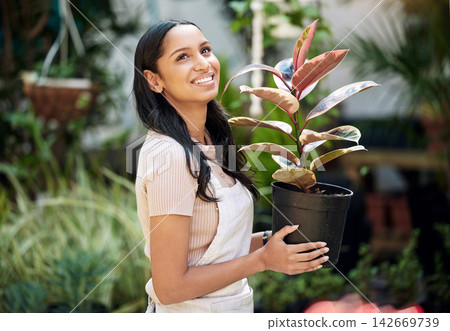 Woman, home and happy in garden with plant for nature, environment and ecology. Agriculture, crop and smile in outdoor with thinking for hobby, memories and enjoy as routine for sustainability Woman, home and happy in garden with plant for nature, environment and ecology. Agriculture, crop and smile in outdoor with thinking for hobby, memories and enjoy as routine for sustainability 142669739