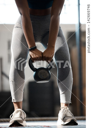 Gym, hands and person with kettlebell for bodybuilding, exercise and strong arm muscle development. Weightlifting, workout and body toning in health, fitness or power training at sports club in day Gym, hands and person with kettlebell for bodybuilding, exercise and strong arm muscle development. Weightlifting, workout and body toning in health, fitness or power training at sports club in day 142669746