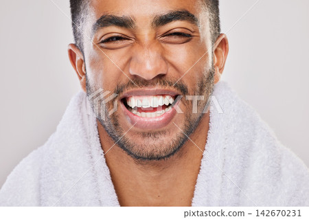 Man, portrait and happiness for teeth whitening in studio with health, wellness and smile by backdrop. Male person, dental care and bad breath treatment for mouth, cleaning an grooming with pride Man, portrait and happiness for teeth whitening in studio with health, wellness and smile by backdrop. Male person, dental care and bad breath treatment for mouth, cleaning an grooming with pride 142670231