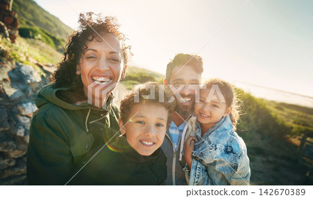 Holiday, mountain and portrait of family with smile, nature and outdoor bonding together on travel adventure. Mom, dad and children on summer vacation with hiking, happy face and sunshine on hill Holiday, mountain and portrait of family with smile, nature and outdoor bonding together on travel adventure. Mom, dad and children on summer vacation with hiking, happy face and sunshine on hill 142670389