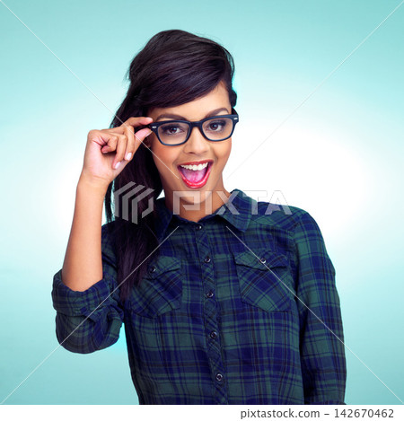 Happy, young woman and glasses for eyesight, healthcare and clear vision isolated in studio. Female person or model and smile for eye wear, optometry and prescription frames with cosmetic spectacles Happy, young woman and glasses for eyesight, healthcare and clear vision isolated in studio. Female person or model and smile for eye wear, optometry and prescription frames with cosmetic spectacles 142670462