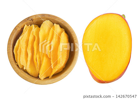 dried and fresh mango in wooden bowl isolated on white background. Top view. Flat lay dried and fresh mango in wooden bowl isolated on white background. Top view. Flat lay 142670547