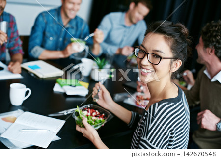 Meeting, smile and portrait of woman with salad in office for team building lunch for collaboration. Creative, happy and Asian female designer with colleagues eating healthy meal in workplace. Meeting, smile and portrait of woman with salad in office for team building lunch for collaboration. Creative, happy and Asian female designer with colleagues eating healthy meal in workplace. 142670548