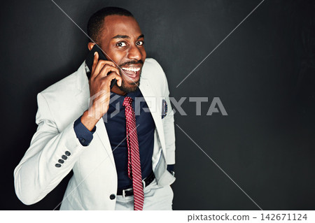 Black man, lawyer and happy with phone call in studio on dark background with job offer or interview. Mockup, business and surprised with communication, networking and conversation for good news Black man, lawyer and happy with phone call in studio on dark background with job offer or interview. Mockup, business and surprised with communication, networking and conversation for good news 142671124