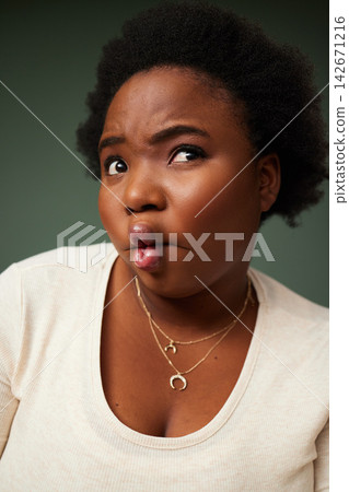 Black woman, fish lips and funny face for comedy, playful and goofy isolated in studio background. Female person, casual and kiss mouth joke with comic eyes for crazy, confident and silly humor Black woman, fish lips and funny face for comedy, playful and goofy isolated in studio background. Female person, casual and kiss mouth joke with comic eyes for crazy, confident and silly humor 142671216