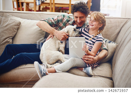 Sofa, tablet and father with child and dog in home for watching movies, cartoons and online entertainment. Family, love and dad with girl on digital tech for internet, videos and relax on weekend Sofa, tablet and father with child and dog in home for watching movies, cartoons and online entertainment. Family, love and dad with girl on digital tech for internet, videos and relax on weekend 142671937