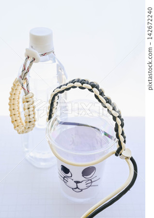 Handmade drink holder woven with paracord Handmade drink holder woven with paracord 142672240