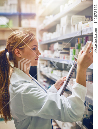 Woman, pharmacist or reading boxes for inventory or stock check at pharmacy for pills information. Clipboard, medical internship or girl by shelf for pharmaceutical drugs for medicine and product Woman, pharmacist or reading boxes for inventory or stock check at pharmacy for pills information. Clipboard, medical internship or girl by shelf for pharmaceutical drugs for medicine and product 142672361
