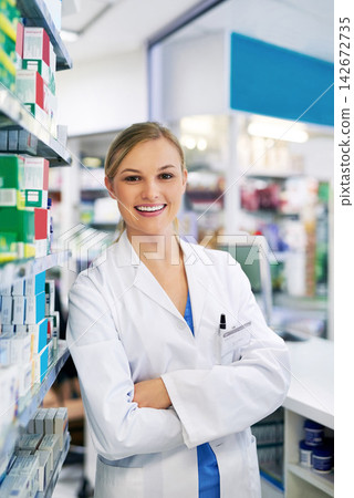 Woman, portrait and pharmacist with arms crossed for healthcare purchase, professional or medication. Female person, face and drug store for antibiotic sale or flu season product, trust or shopping Woman, portrait and pharmacist with arms crossed for healthcare purchase, professional or medication. Female person, face and drug store for antibiotic sale or flu season product, trust or shopping 142672735