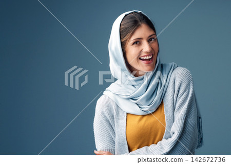 Portrait, woman and hijab in studio, fashion and smile on gray background. Head scarf, Ramandan and stylish for religious Arabic female model, muslim or mockup space for minimalism Islamic Eid outfit Portrait, woman and hijab in studio, fashion and smile on gray background. Head scarf, Ramandan and stylish for religious Arabic female model, muslim or mockup space for minimalism Islamic Eid outfit 142672736