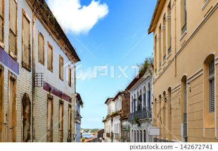 Colorful facades of colonial mansions Colorful facades of colonial mansions 142672741