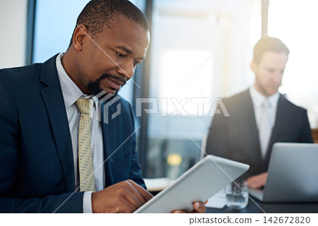 Coworking, lawyers or businessman on tablet at law firm for consulting, legal advice or networking. Corporate case, diversity or attorneys on technology for schedule update, news or feedback review Coworking, lawyers or businessman on tablet at law firm for consulting, legal advice or networking. Corporate case, diversity or attorneys on technology for schedule update, news or feedback review 142672820