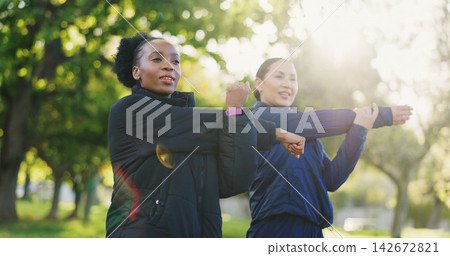 Interracial women, fitness and stretching body for workout, exercise or training together in nature. Female person, friends or personal trainer in warm up stretch or coaching at park for wellness Interracial women, fitness and stretching body for workout, exercise or training together in nature. Female person, friends or personal trainer in warm up stretch or coaching at park for wellness 142672821