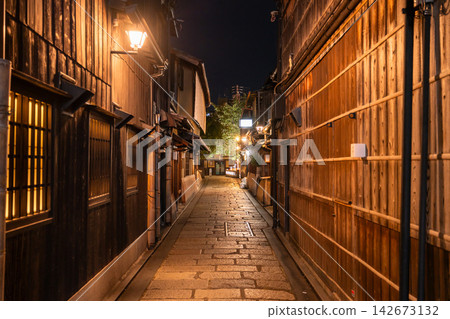 A night view of the charming alleyways in Gion Shirakawa, Kyoto, lined with cobblestone streets and traditional Kyoto townhouses. A night view of the charming alleyways in Gion Shirakawa, Kyoto, lined with cobblestone streets and traditional Kyoto townhouses. 142673132
