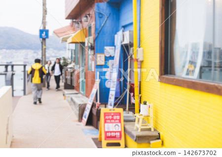 Huinnyeoul Culture village, Busan city, South Korea, Yeongseon-dong, Yeongdo District, Busan, view of streets and multicoloured houses of seaside town, Huinnyeoul-gil, Republic of Korea travel 142673702
