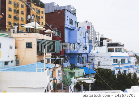 Huinnyeoul Culture village, Busan city, South Korea, Yeongseon-dong, Yeongdo District, Busan, view of streets and multicoloured houses of seaside town, Huinnyeoul-gil, Republic of Korea travel Huinnyeoul Culture village, Busan city, South Korea, Yeongseon-dong, Yeongdo District, Busan, view of streets and multicoloured houses of seaside town, Huinnyeoul-gil, Republic of Korea travel 142673705