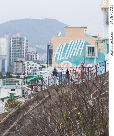 Huinnyeoul Culture village, Busan city, South Korea, Yeongseon-dong, Yeongdo District, Busan, view of streets and multicoloured houses of seaside town, Huinnyeoul-gil, Republic of Korea travel Huinnyeoul Culture village, Busan city, South Korea, Yeongseon-dong, Yeongdo District, Busan, view of streets and multicoloured houses of seaside town, Huinnyeoul-gil, Republic of Korea travel 142673725