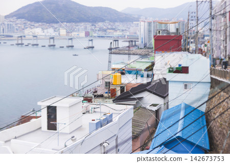 Huinnyeoul Culture village, Busan city, South Korea, Yeongseon-dong, Yeongdo District, Busan, view of streets and multicoloured houses of seaside town, Huinnyeoul-gil, Republic of Korea travel Huinnyeoul Culture village, Busan city, South Korea, Yeongseon-dong, Yeongdo District, Busan, view of streets and multicoloured houses of seaside town, Huinnyeoul-gil, Republic of Korea travel 142673753