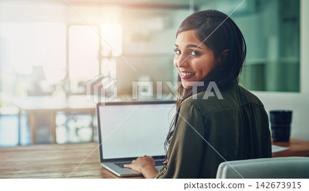 Business woman, laptop and portrait with at desk with blank screen and web designer with tech. Office, professional and creative agency with website design and internet search for company app project Business woman, laptop and portrait with at desk with blank screen and web designer with tech. Office, professional and creative agency with website design and internet search for company app project 142673915