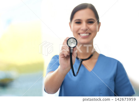 Clinic, nurse or woman in portrait with stethoscope for blood pressure, heart rate and health results. Medical, female employee and tool to monitor patient, hearing and listening to sound in hospital Clinic, nurse or woman in portrait with stethoscope for blood pressure, heart rate and health results. Medical, female employee and tool to monitor patient, hearing and listening to sound in hospital 142673959