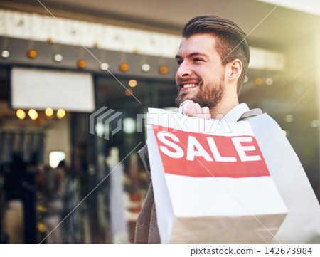 Man, happy and shopping bags with sale outdoor for retail promotion, store discount and excited. Shopper, person and customer with package in city for clothing, gift and fashion deal in urban town Man, happy and shopping bags with sale outdoor for retail promotion, store discount and excited. Shopper, person and customer with package in city for clothing, gift and fashion deal in urban town 142673984