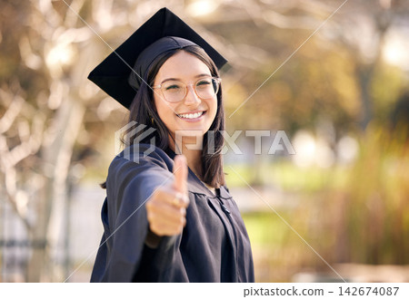 Thumbs up, outdoor portrait and woman for graduation with celebration, scholarship and support for college. Female graduate, goal and hand with yes emoji in campus for promote education and success Thumbs up, outdoor portrait and woman for graduation with celebration, scholarship and support for college. Female graduate, goal and hand with yes emoji in campus for promote education and success 142674087