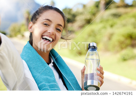 Fitness selfie, happy woman and water bottle in nature for social media, live streaming and vlog workout. Gen z, influencer and female runner with liquid for exercise, smile and person portrait Fitness selfie, happy woman and water bottle in nature for social media, live streaming and vlog workout. Gen z, influencer and female runner with liquid for exercise, smile and person portrait 142674191